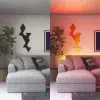 4-nanoleaf-shapes-ultra-black-triangles-light-panels-smarter-kit-9-living-room@1x